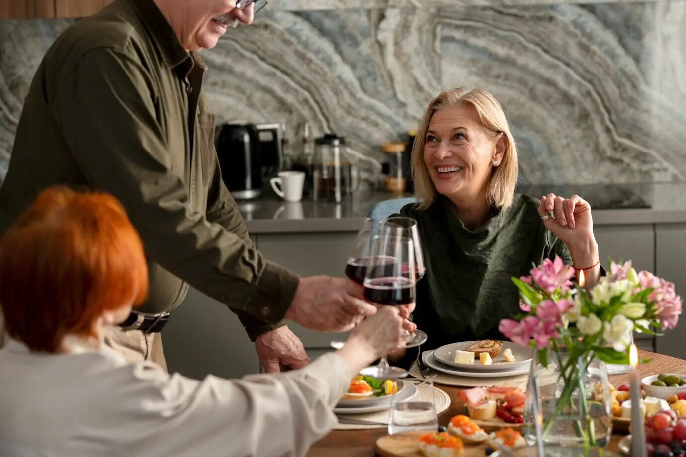 Close-up of people clinking glasses